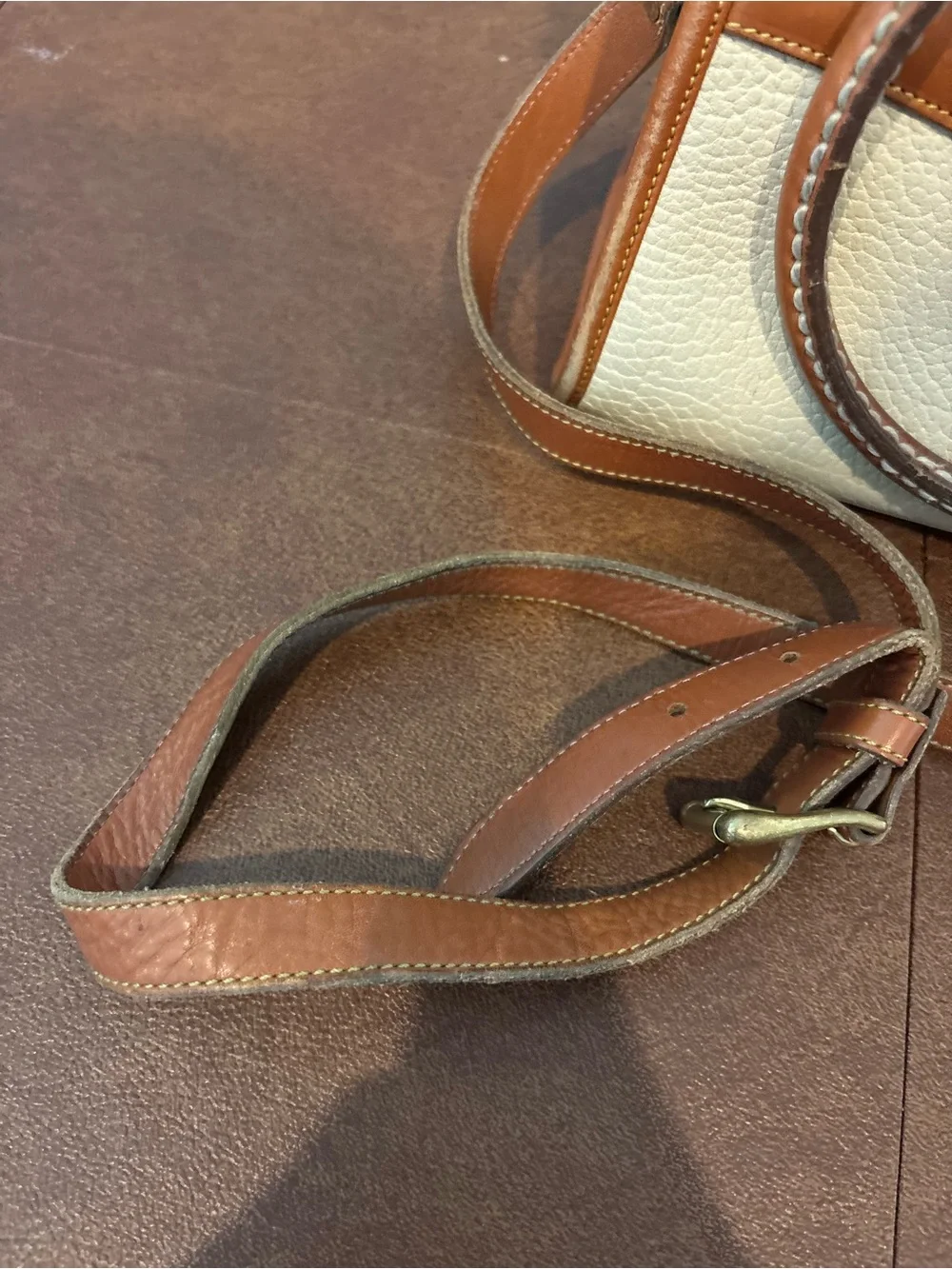 Dooney & Bourke Cream and Brown Leather Satchel with Gold Hardware